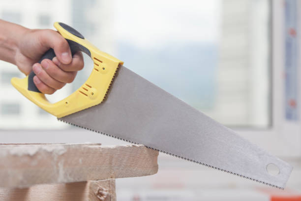 istock Sawing of wooden whetstone 695104982