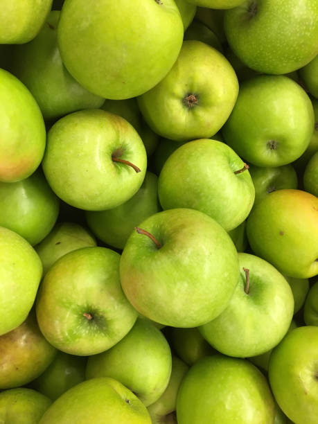 istock Top view of green apples 695107094
