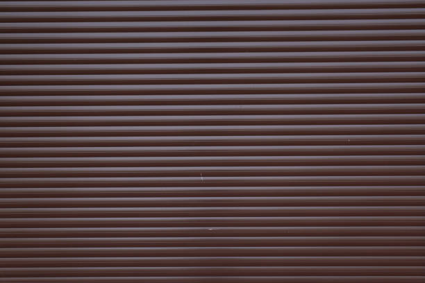 istock Garage door container stripped texture metal background with horizontal lines. 695107780