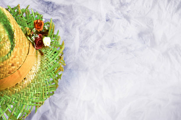 Hat and spikelets on white background, space for text