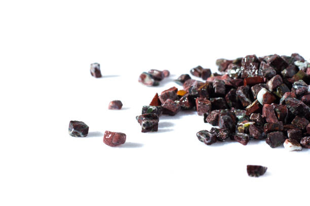istock beautiful natural stone burgundy spilled on a white background 695111030