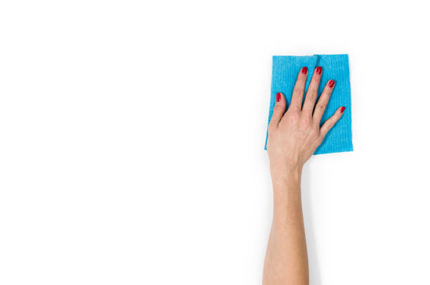 istock Woman's hand cleaning isolated on white background 695112422