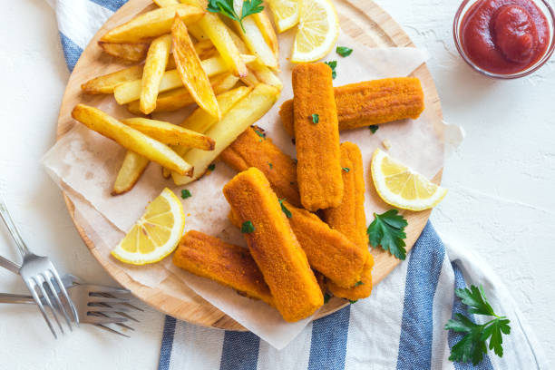 istock Fried Fish Sticks with French Fries 695116670