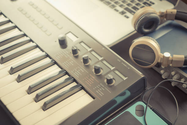 istock Home Music Studio equipments with gold color tone 695120508