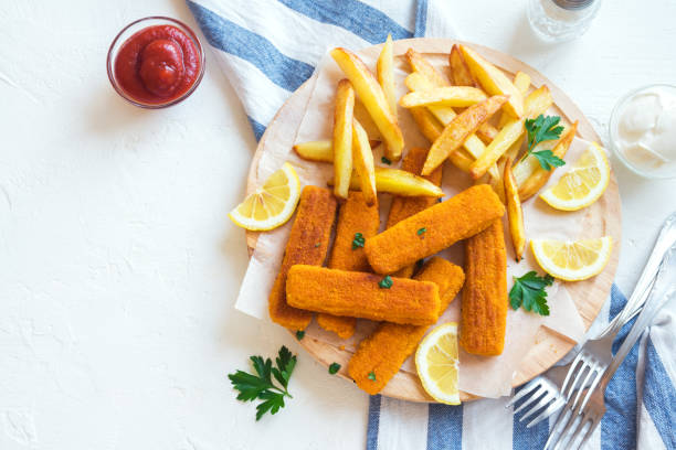 istock Fried Fish Sticks with French Fries 695120722