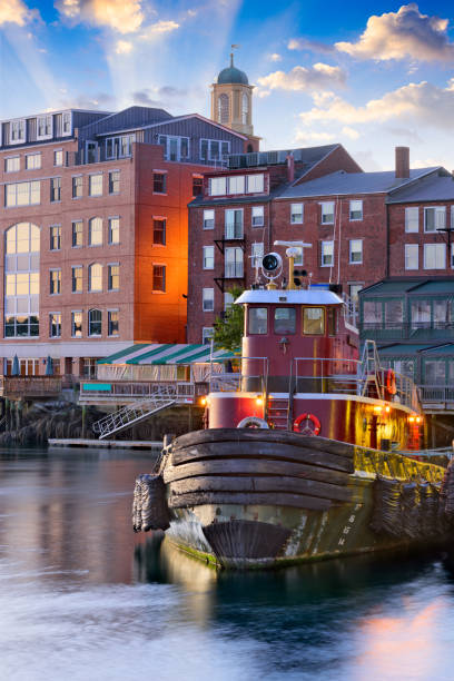 Portsmouth, New Hampshire Portsmouth, New Hampshire, USA town skyline on the Piscataqua River. portsmouth nh stock pictures, royalty-free photos & images