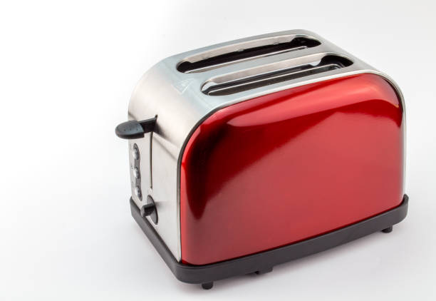 istock Bright red shiny retro toaster isolated on white 695123554