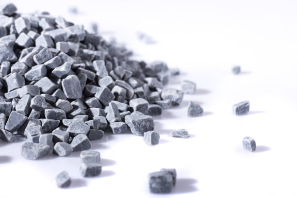 istock beautiful natural gray stones scattered on a white background 695124176