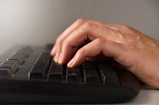 Computer Keyboard In Using Using A Computer Keyboard Stock Photo - Download Image Now - Online ...
