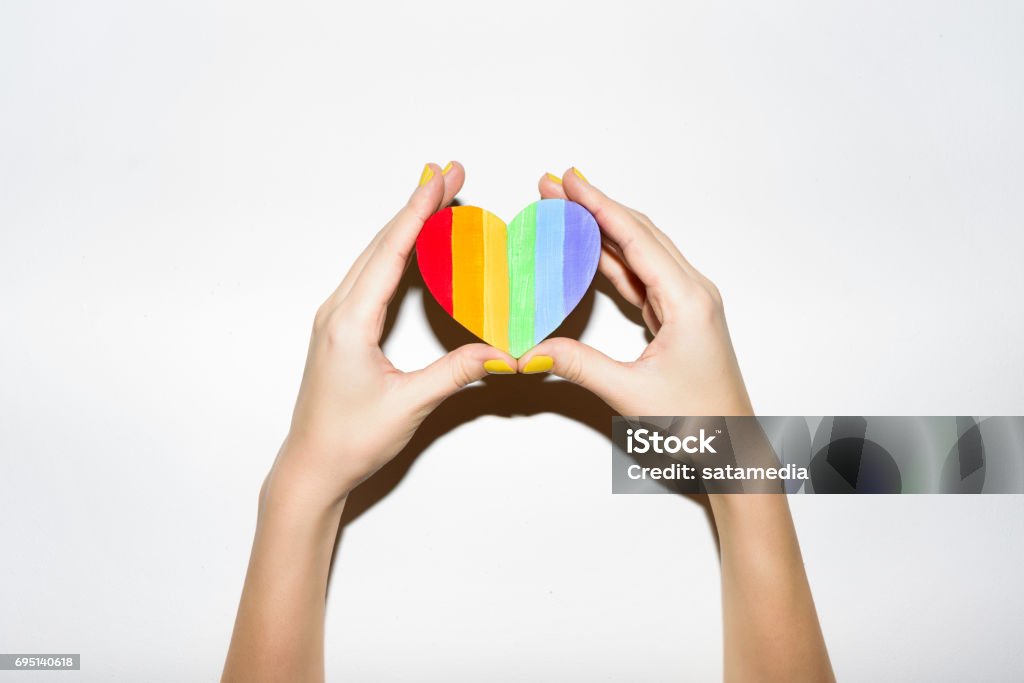 Lgbt flag rainbow heart shape on white Heart shaped themed background Rainbow Stock Photo