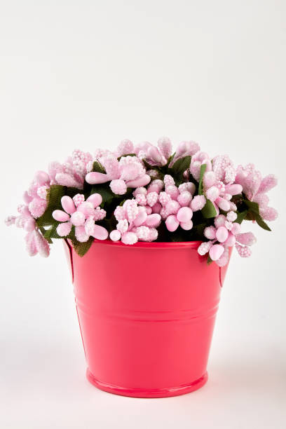 istock Decorative artificial flowers in bucket. 695151446