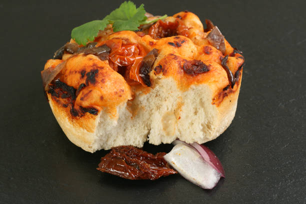 istock focaccia with sun dried tomato and onion 695155044
