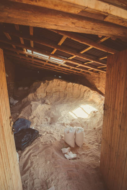 Salt deposited in a dirt built house at Maras salt ponds in Peru's Sacred Valley. stock photo