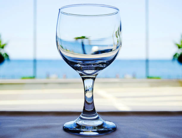 still life photography of a transparent glass on table