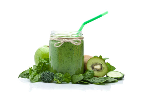 Green vegetable juice isolated on white background