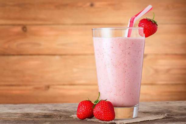istock strawberry milkshake in glass 695167344