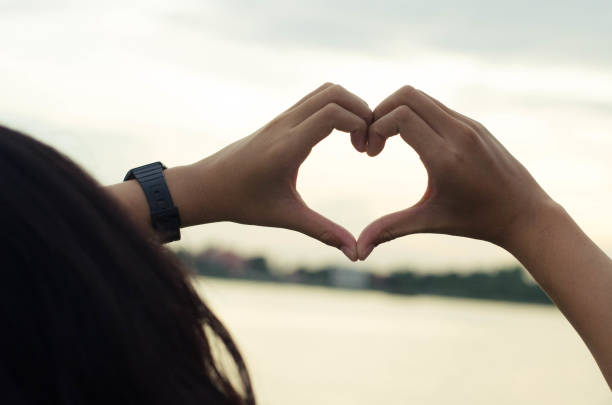 istock hands in the form of heart 695167426