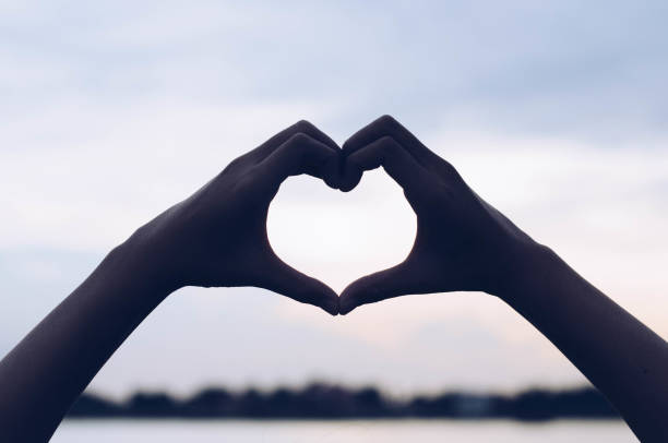 istock hands in the form of heart 695167468