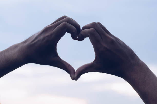 istock hands in the form of heart 695167498