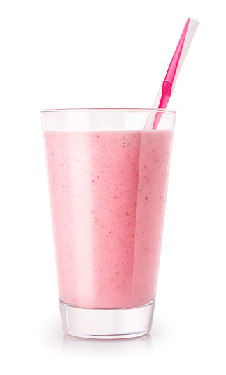 strawberry smoothie with straw in glass isolated on white background. Pink milkshake. Healthy drink