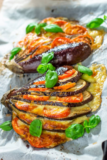 istock Italian traditional dish with eggplant, tomato and mozzarella 695170946