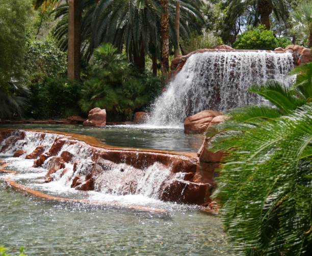 istock Two tiers of man-made waterfalls 695171886
