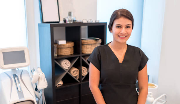 istock Happy masseuse working at the spa 695177024