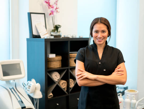 istock Happy masseuse working at the spa 695177188