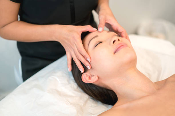 istock Woman getting a facial at the spa 695177196