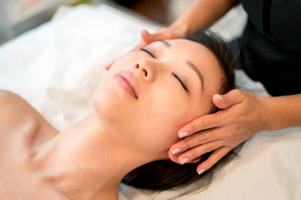 istock Asian woman relaxing at the spa 695177226
