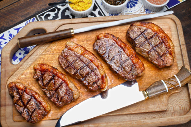 picanha grillé, coupe brésilienne traditionnelle ! - pork tenderloin dinner barbecue photos et images de collection