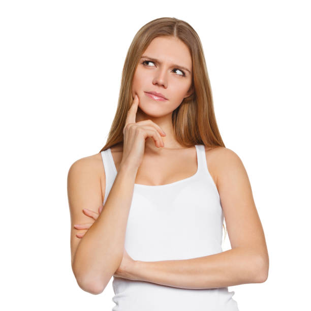 istock Young beautiful woman thinking looking to the side at blank copy space, isolated over white background 695190284