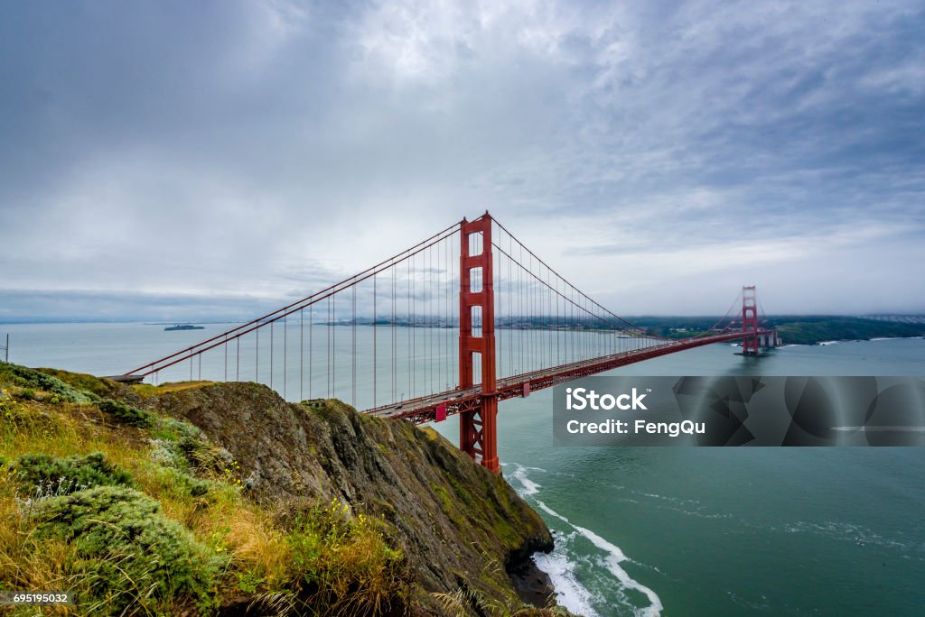 Golden Gate Bridge in a misty day Architect Stock Photo