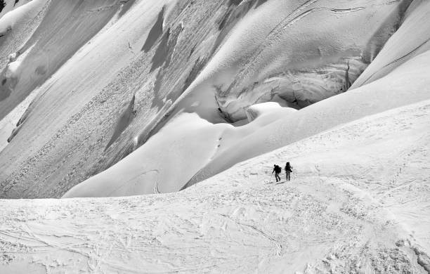 istock Skiers in the snow 695198502