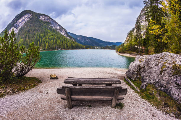 istock Wooden table and benches for picnics 695201626