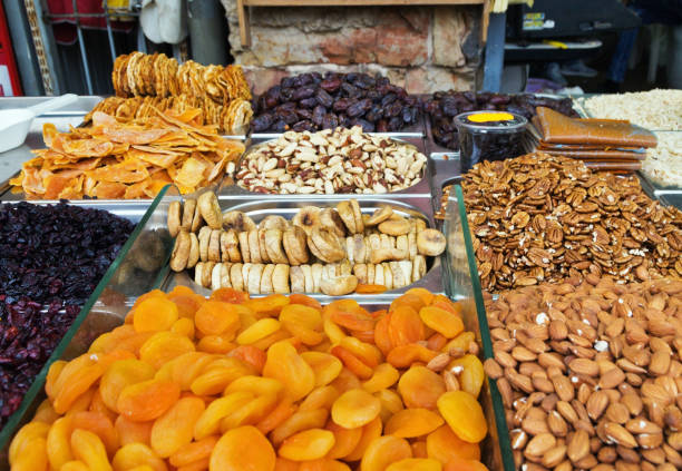 istock Dried fruits and nuts on the counter 695211774