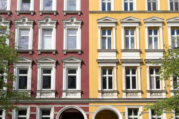 facade of a red and yellow house in Berlin Kreuzberg