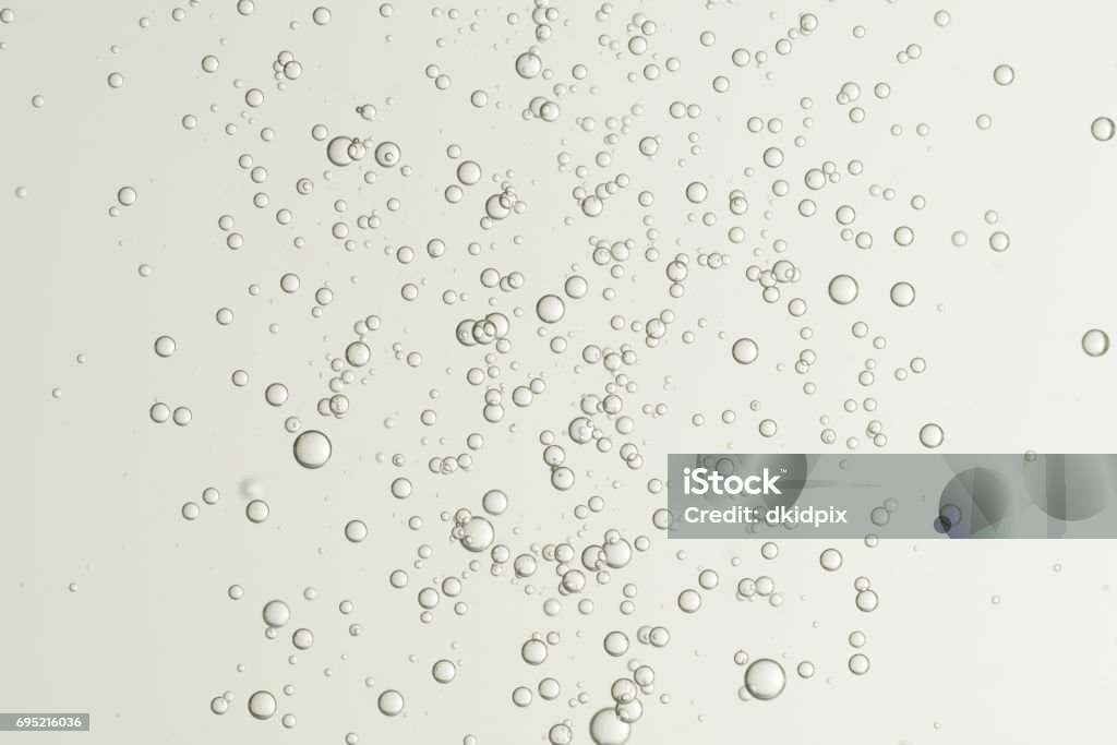 FIzz Beautiful champagne fizz bubbles, soars over a blurred background. Bubble Stock Photo