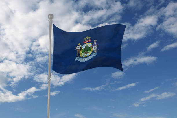 istock Maine flag waving in the sky 695249232