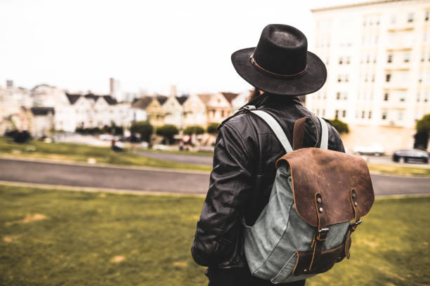 istock solo traveler in alamo square, san francisco 695249496
