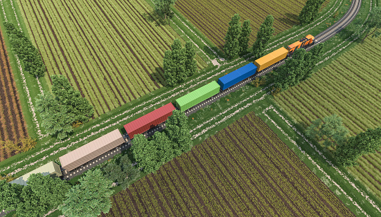 3d rendering image of a freight train in the middle of cultivated lands