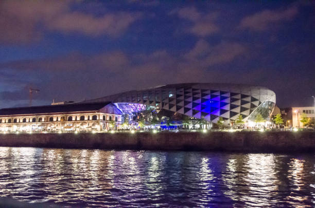 istock Balna Shopping Center over Danube river at summer night 695249724