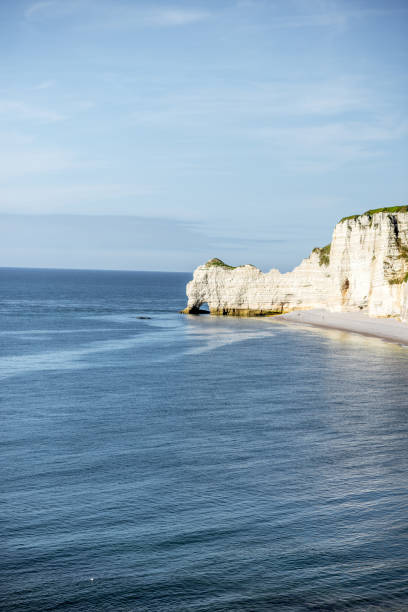 istock Landscape view on the rocky coastline in Etretat 695250018