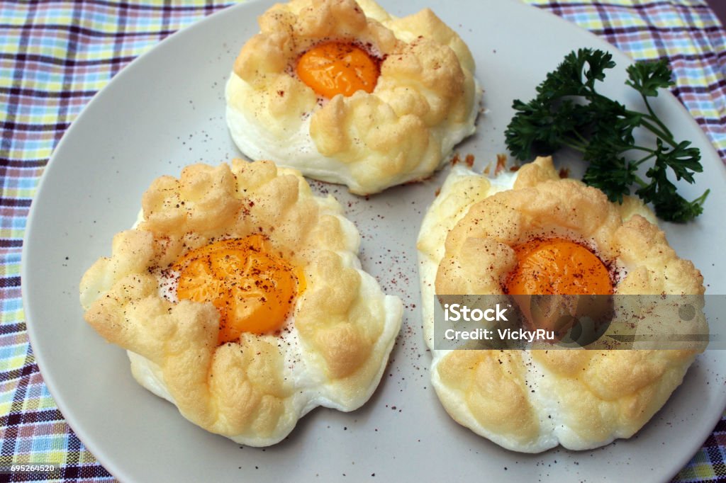 Cloud Eggs or Egg Nests A delicious breakfast with baked eggs Cloud - Sky Stock Photo