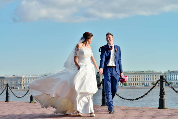 istock Wedding couple on the nature is walking 695275910