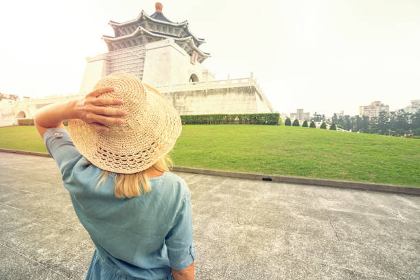 istock Young woman visiting asian temple, Taiwan 695284282