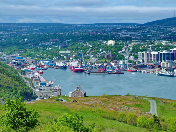 Ships in St. John`s Harbour, Newfoundland Ships along the wharf in St. John`s harbour, Newfoundland, Canada. newfoundland island photos stock pictures, royalty-free photos & images