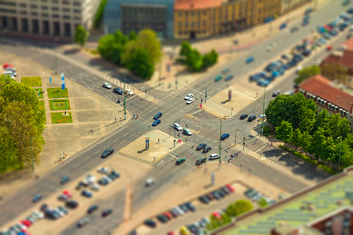 Aerial view of cars in a road junction in a street of Berlin city. with tilt-shift effect.