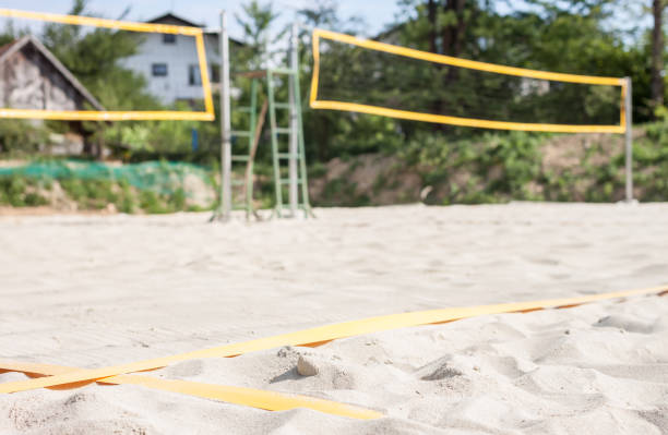 empty beach volleyball court ready to play game