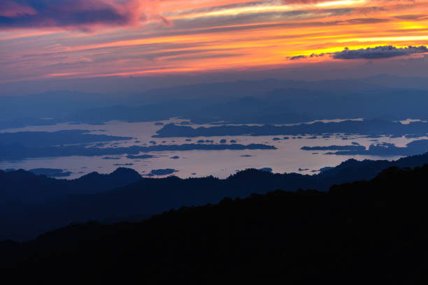 istock Beautiful freshwater lagoon with mountains island at sunset. 695294852